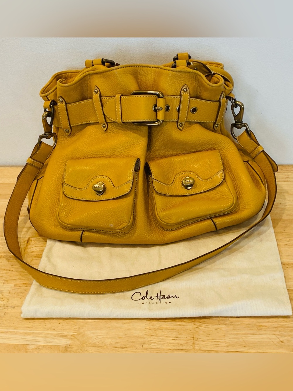 Cole Haan yellowy Brown Pebble Leather
Belted Hobo Bag brass hardware dust bag